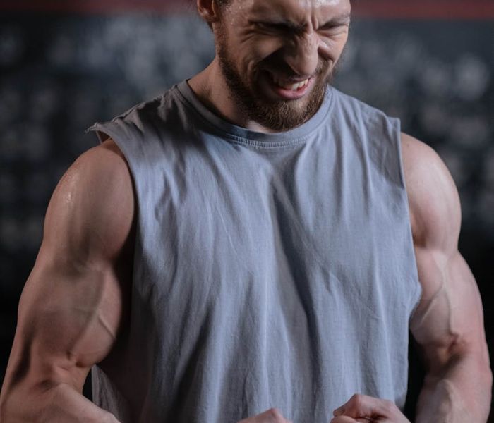 Athlete showing focus and determination during a workout.